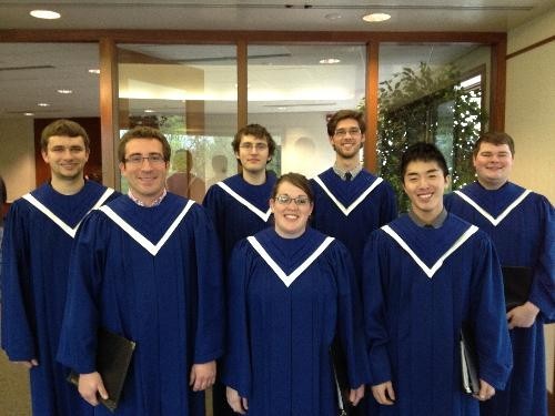 Seven trombone students in choir robes before a Student Recital Hour performance.